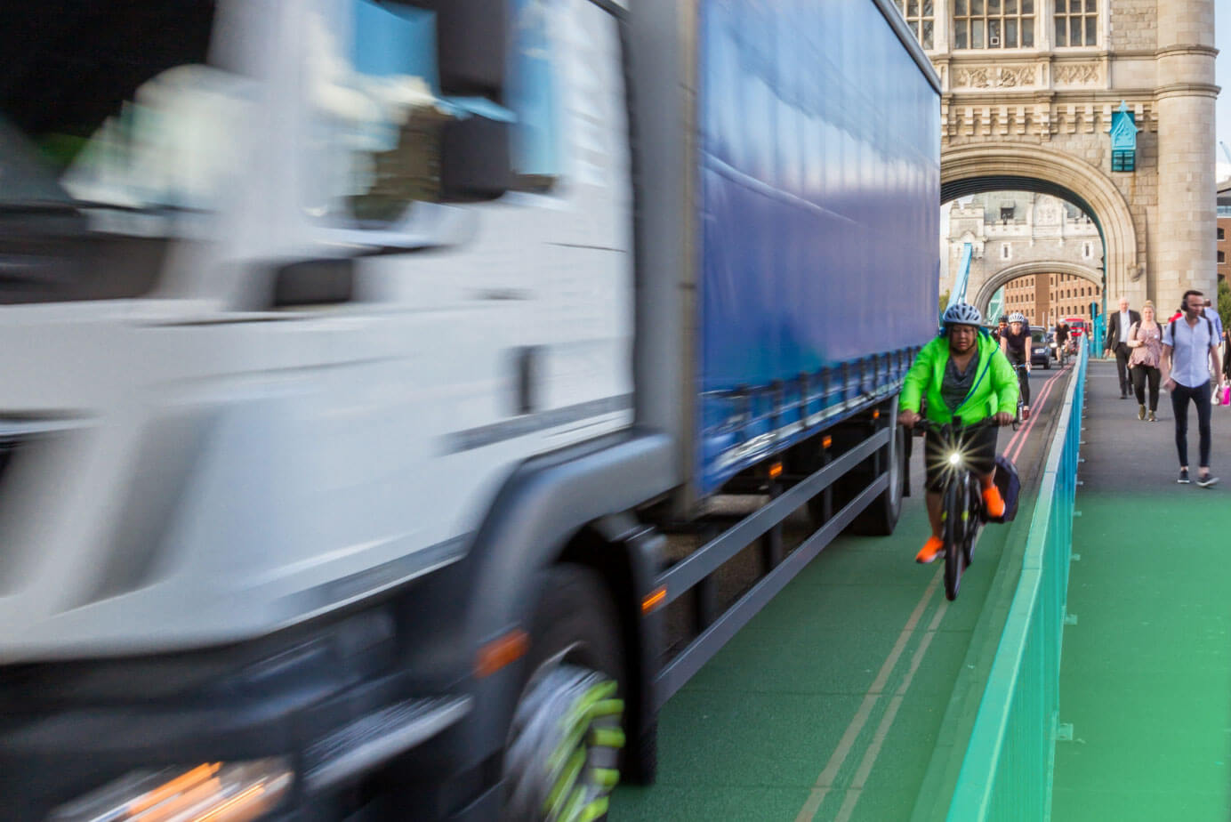 HGV passing a cyclist in an urban environment
